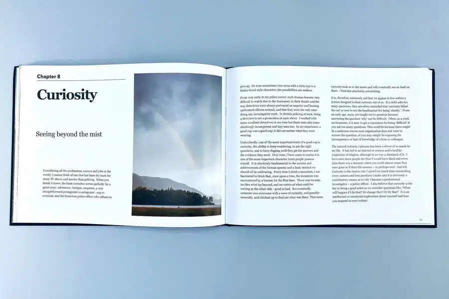 A stack of professionally printed photo books showcasing premium quality