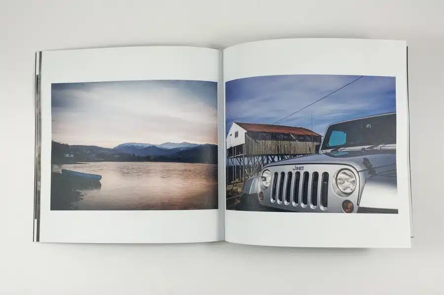 A premium photo portfolio book with vibrant, high-quality printed images.