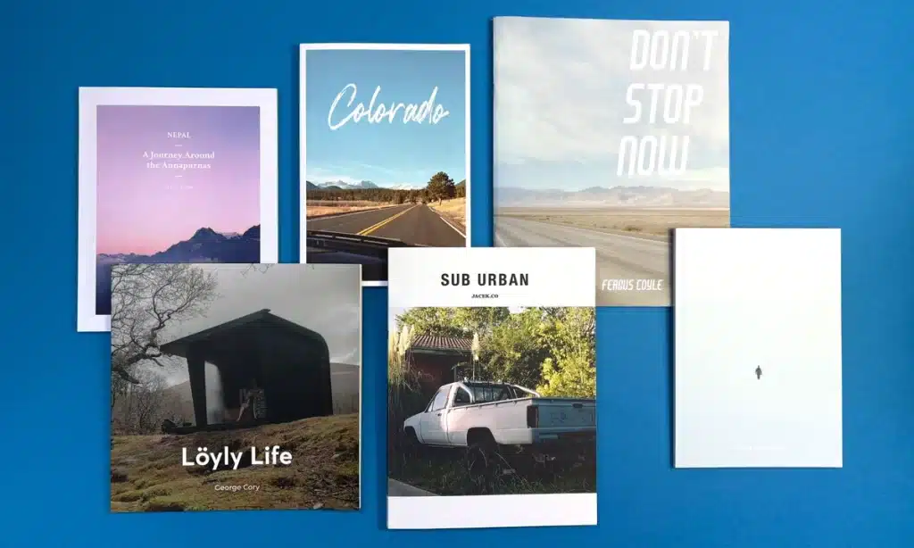 Open hardcover photo book with a stylish layout and text captions