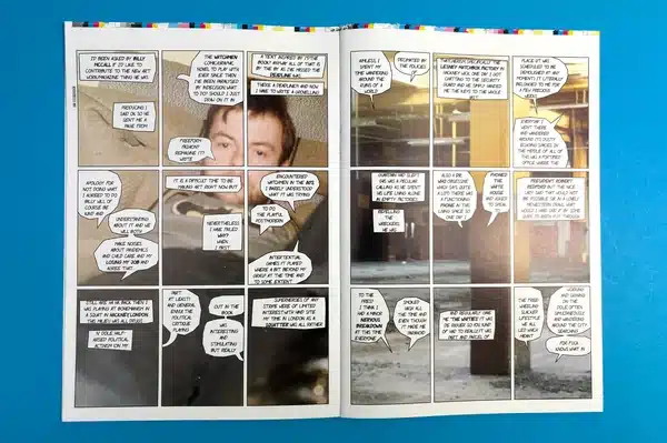 An artist exploring a collection of comic books printed at Ex Why Zed for research and inspiration