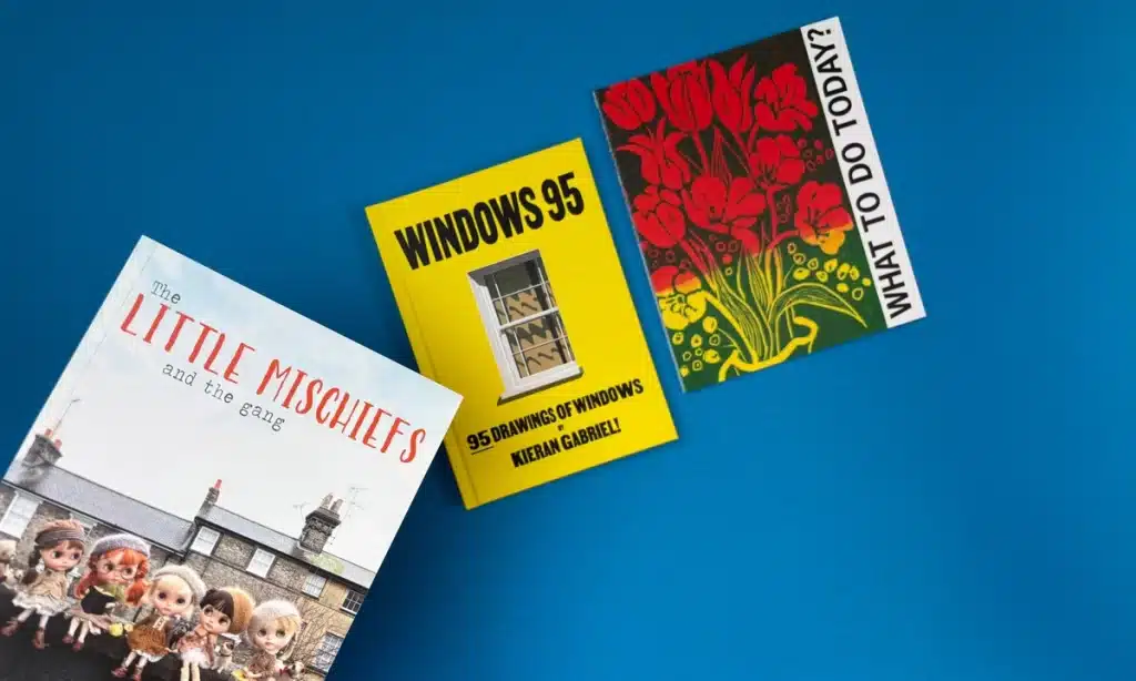 A professionally printed book with a sleek cover and high-quality paper, produced by Ex Why Zed.