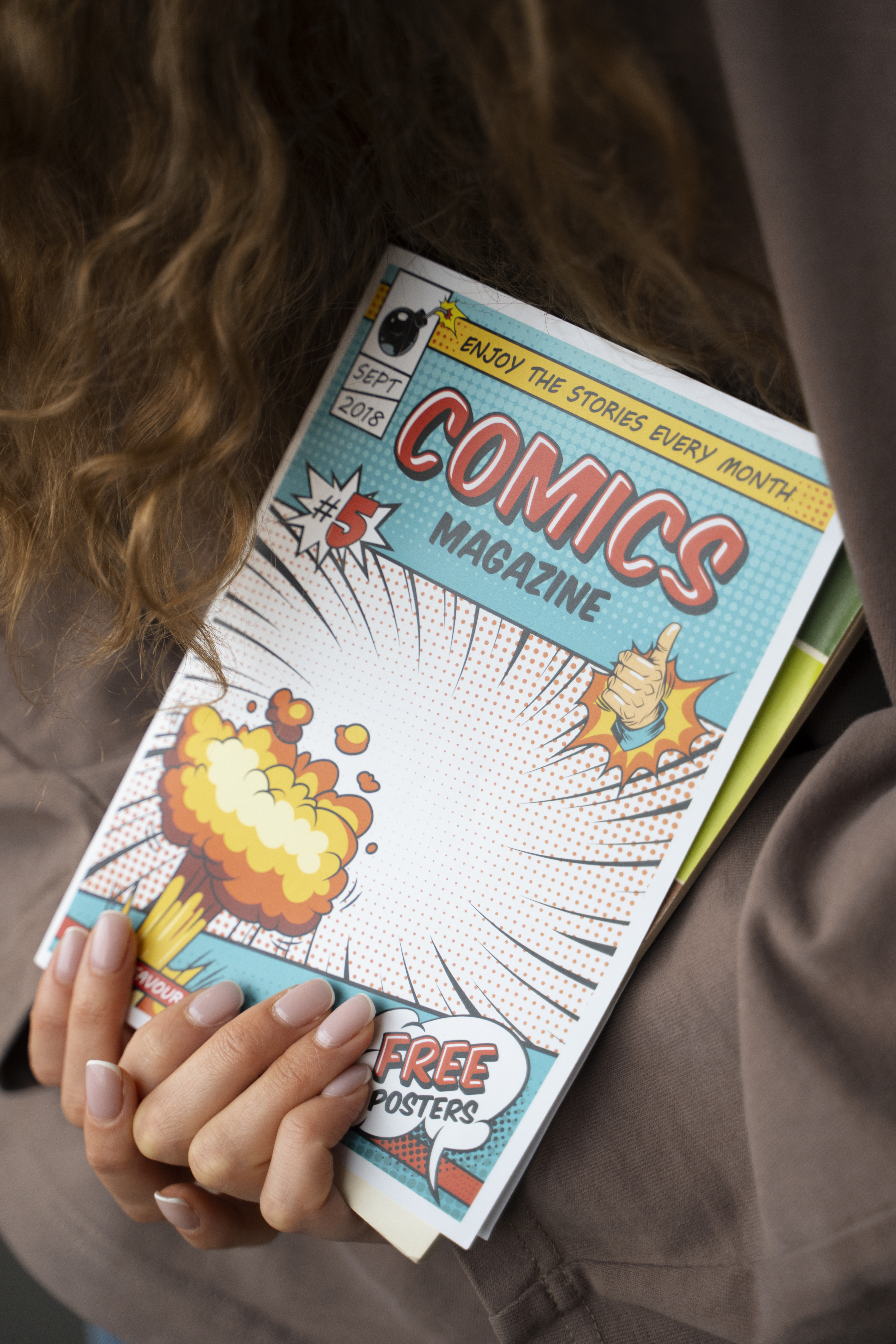 Woman holding a comic book