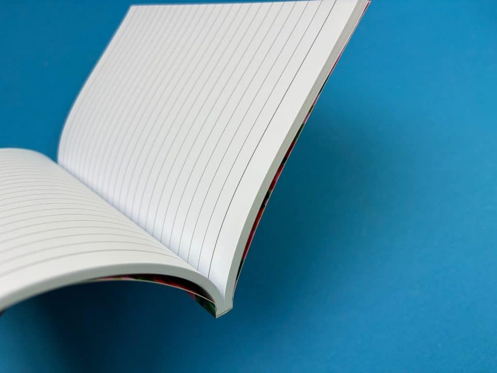 Close-up of perfect binding on a custom printed journal.