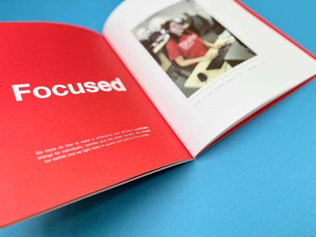 Newsletter design showing modern sans-serif body text with bold creative headers