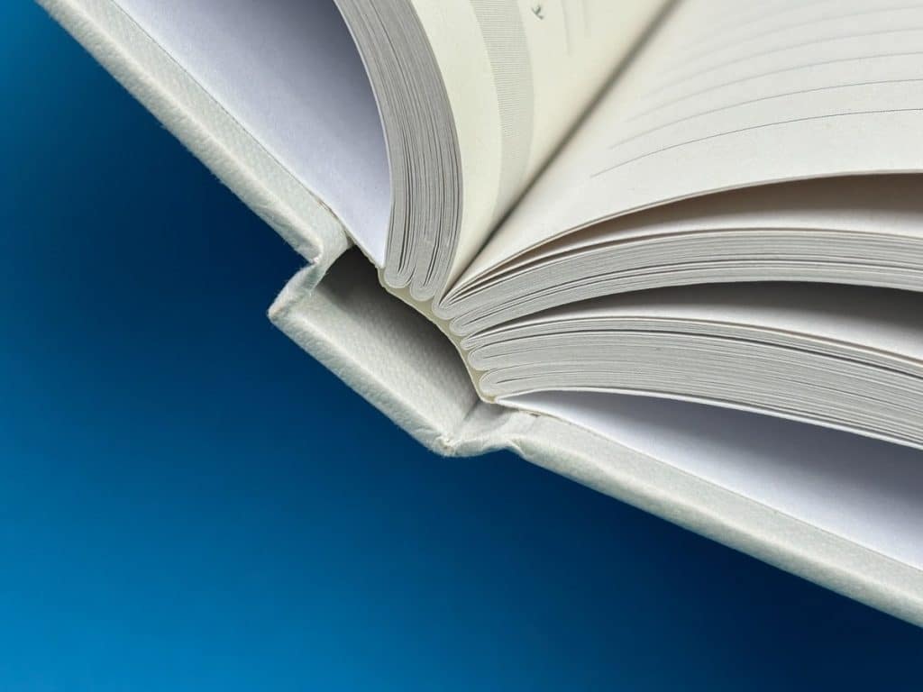 Sewn hardback binding for long-lasting custom journals.