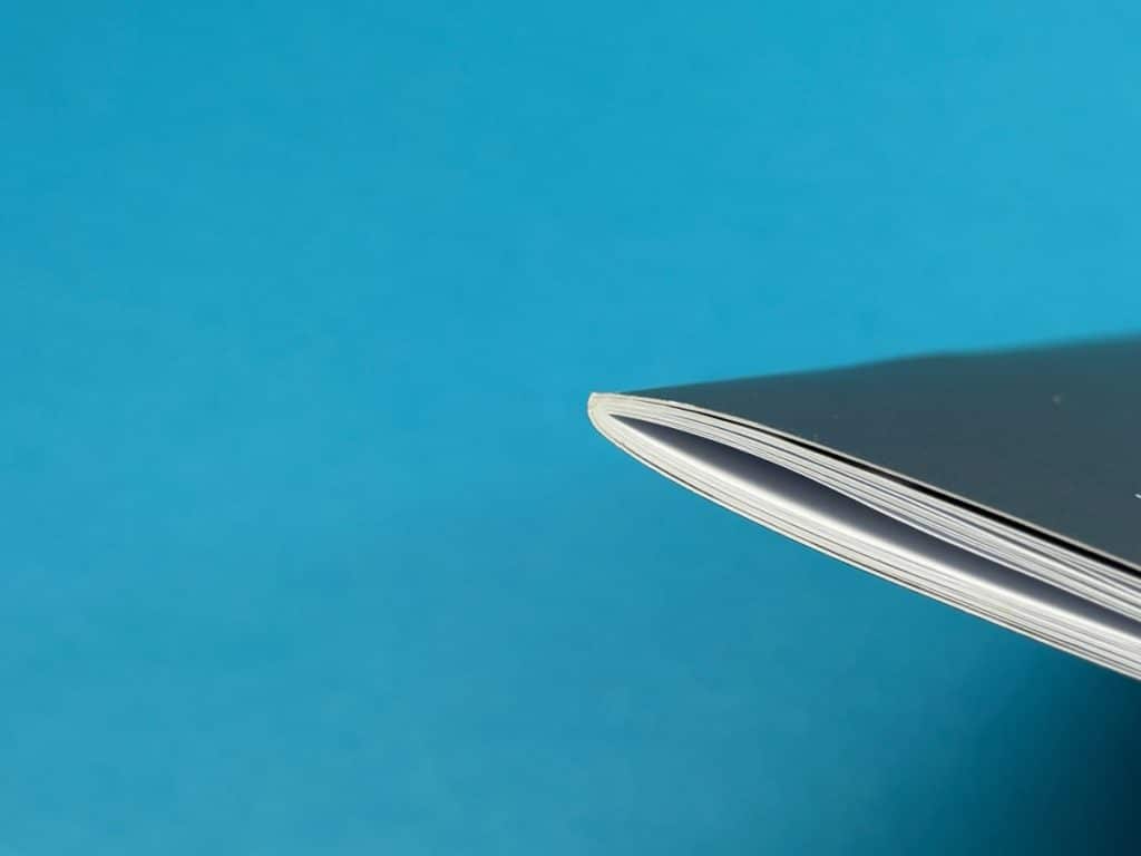 Saddle stitch binding with staples on custom printed journal.