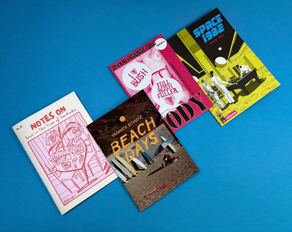 Different zines printed with saddle-stitch and perfect binding on glossy and matte paper
