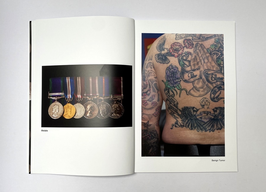 Family history photo book example with generational timeline and old photos.