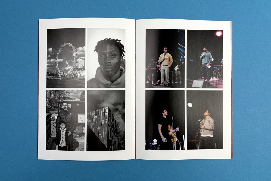 Stapled paperback book laying flat open on a table