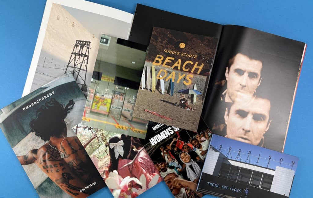 Collage of premium photobooks showing cover finishes and photo spreads for photobook printing in 2026