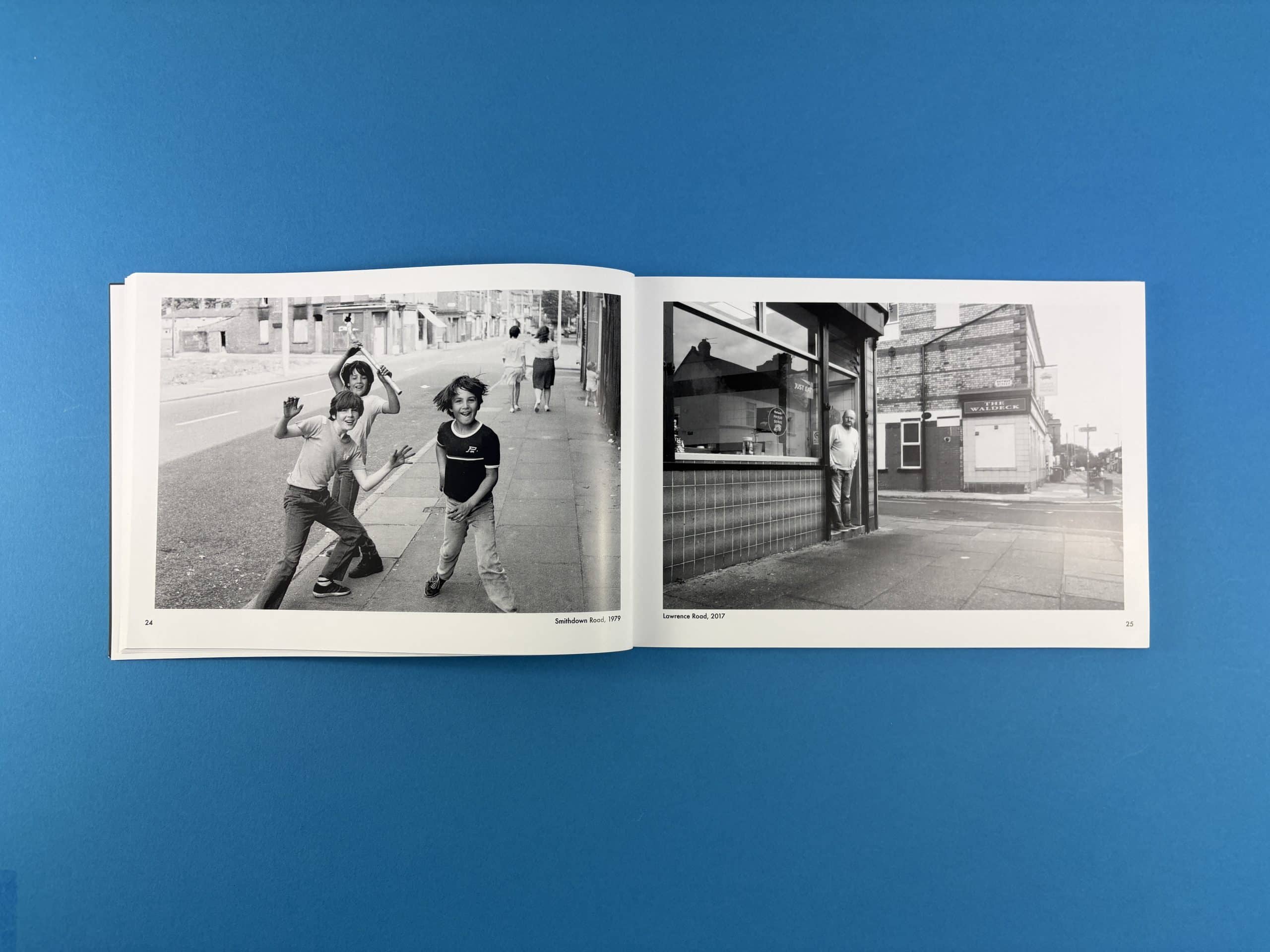 Open spread from Liverpool Volume 1 by Phil Maxwell with candid street photos in black and white