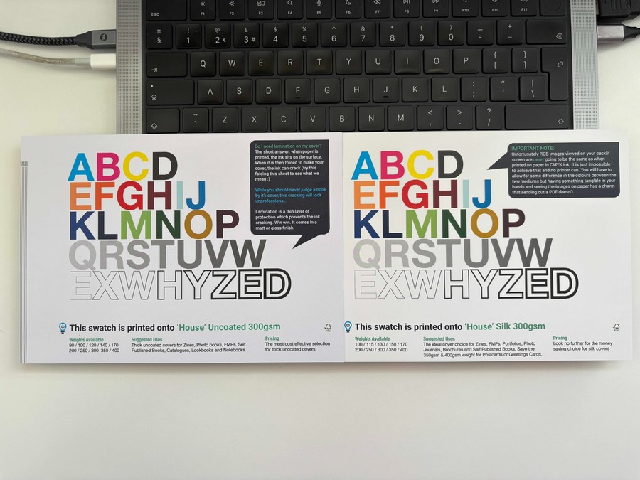 Ex Why Zed paper swatch cards comparing uncoated and silk cover stocks to show ink absorption and colour depth.