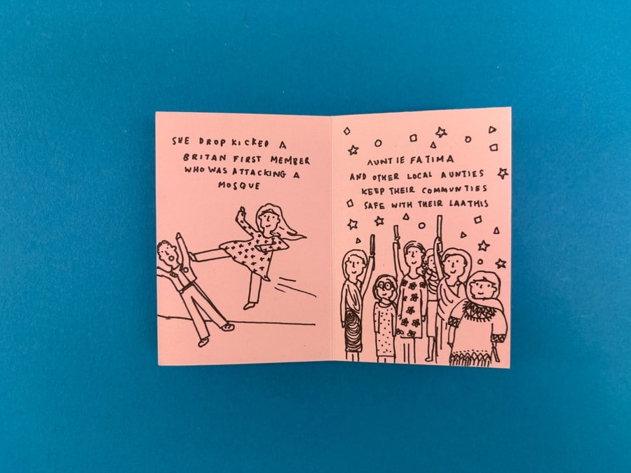 Photograph of an illustrated zine spread showing careful panel layout and positioning for text and image alignment.