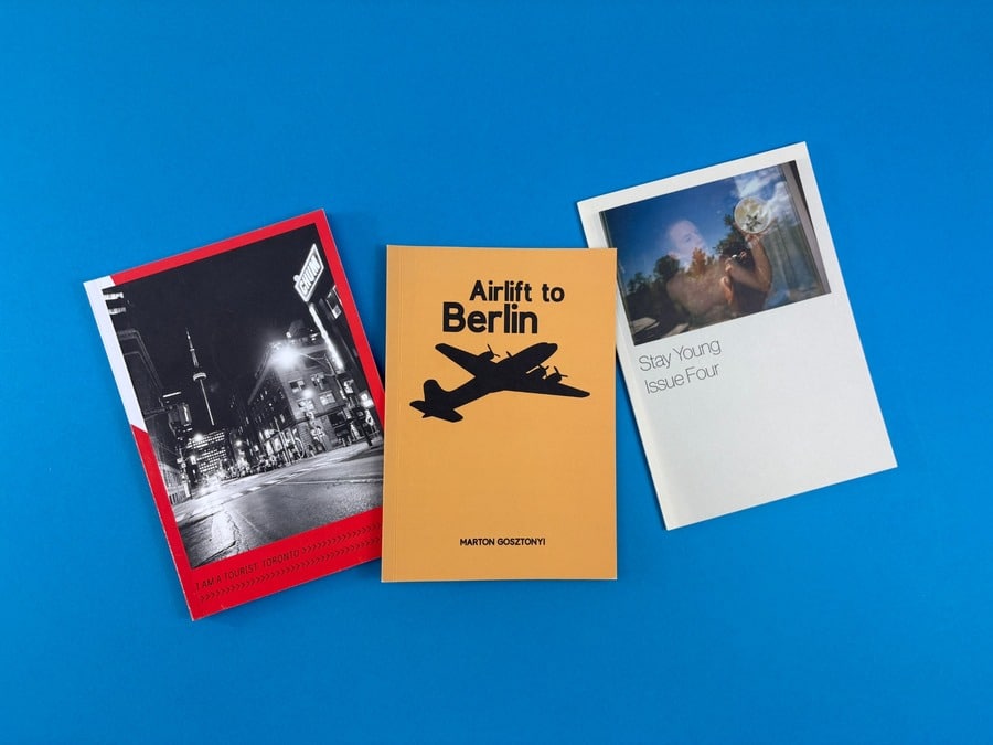 A group of professionally printed books showing the creative variety authors can achieve when working with independent publishers.