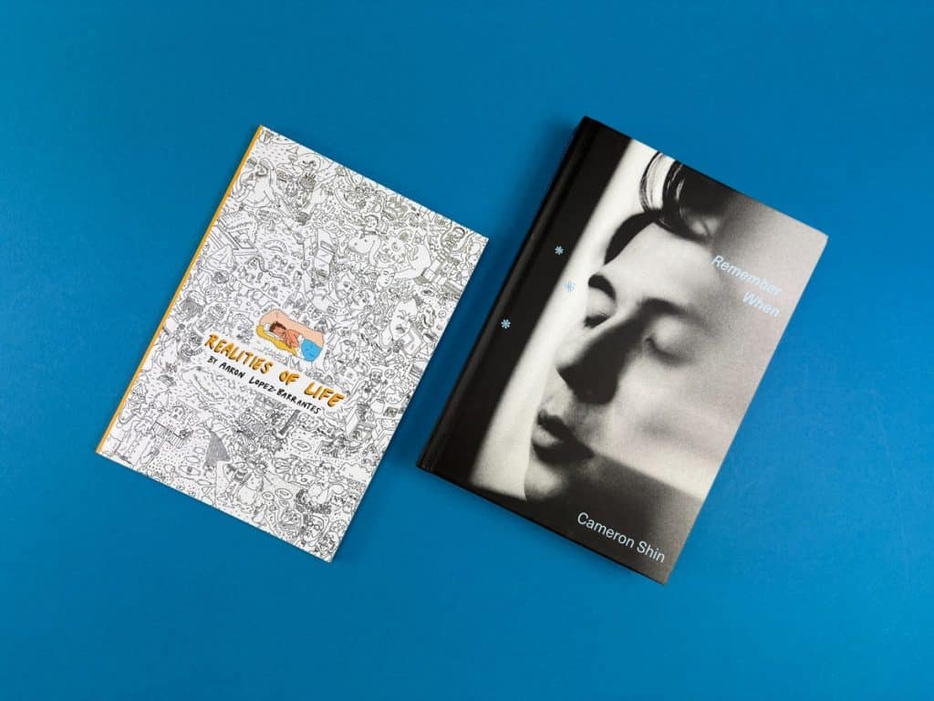 A selection of beautifully printed books on a blue background illustrating indie publishing and self-publishing choices.