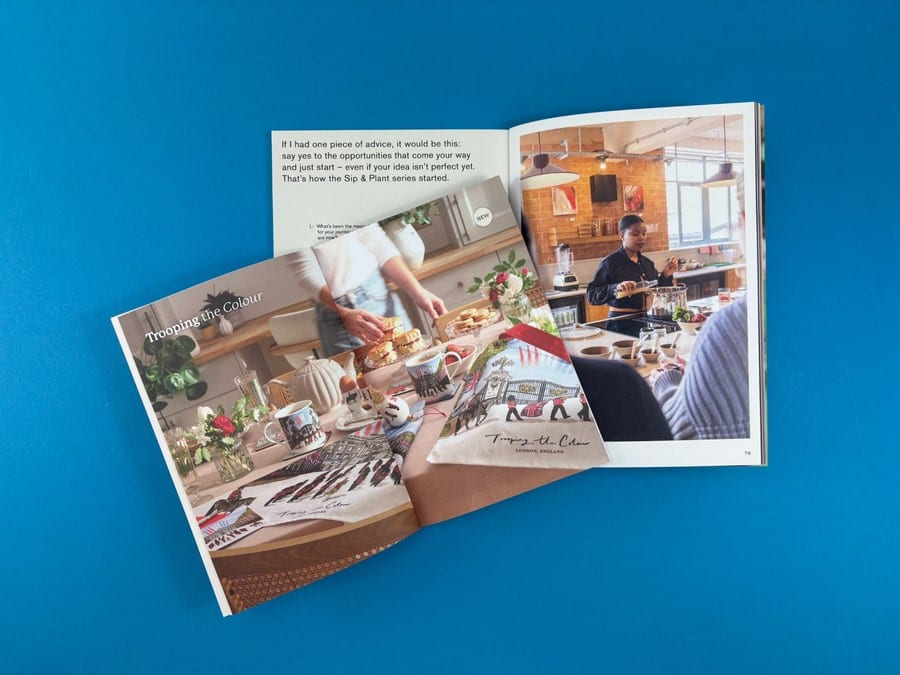Open catalogue spread with wallpaper collection samples showing detailed content and organised visual product information.