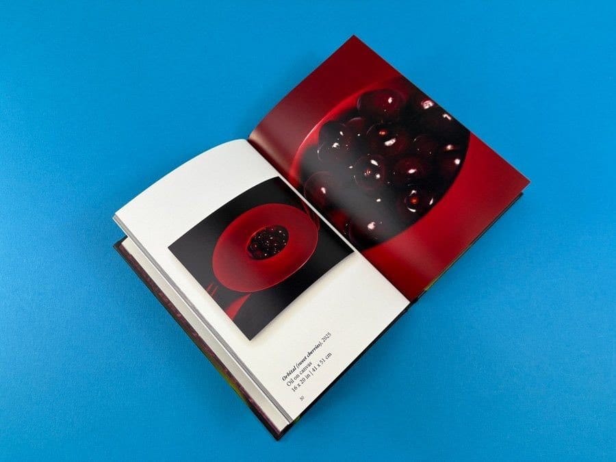 A5 hardback art book printed for Danielle Fretwell’s gallery exhibition, showing how print size is matched to the type of artwork.