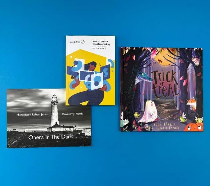 A range of self-published books printed by Ex Why Zed, displayed on a blue background