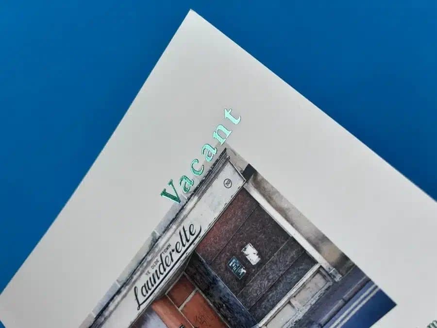 Kent photography book printed by Ex Why Zed, showing how GSM, opacity and coating affect image sharpness and show-through.