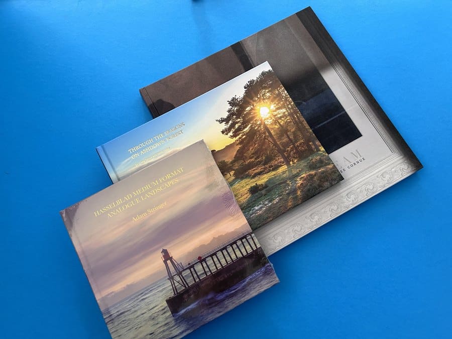 Standard-size printed books produced by Ex Why Zed, an example of how sticking to standard formats keeps printing costs down.