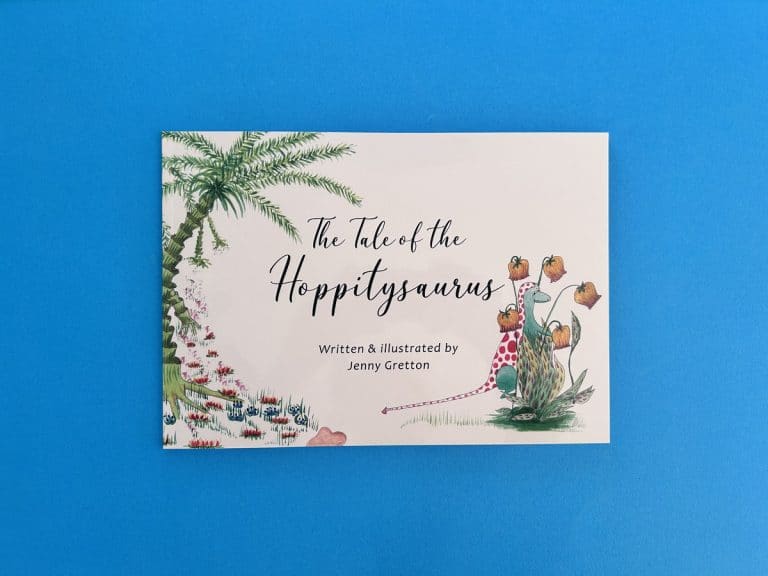 A4 landscape picture book cover with a watercolour palm, a red spotted dinosaur and a flowing script title