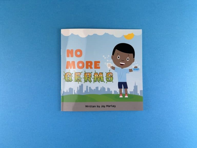 Square children's booklet cover for No More Germs: a smiling boy with soap and GERMS spelt in green germ characters.